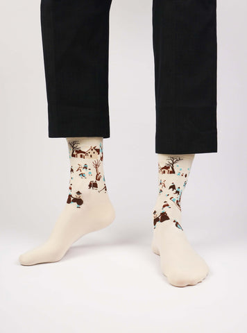 Paysage d'hiver avec patineurs