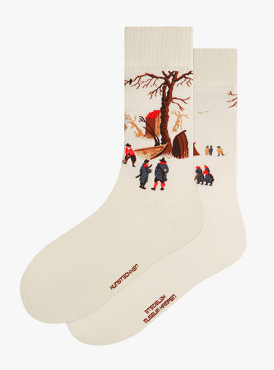 Paysage d'hiver avec patineurs