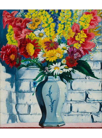 Vase de fleurs contre un mur